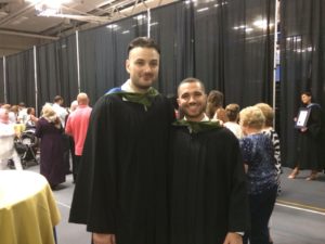A graduation picture of me (left) and one of my best friends (right).